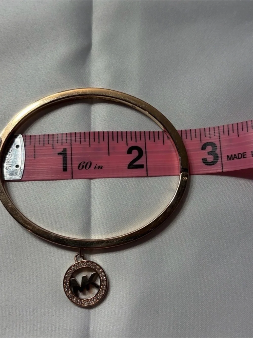 Michael Kors Rose Gold Circular Charm Hinged Bangle